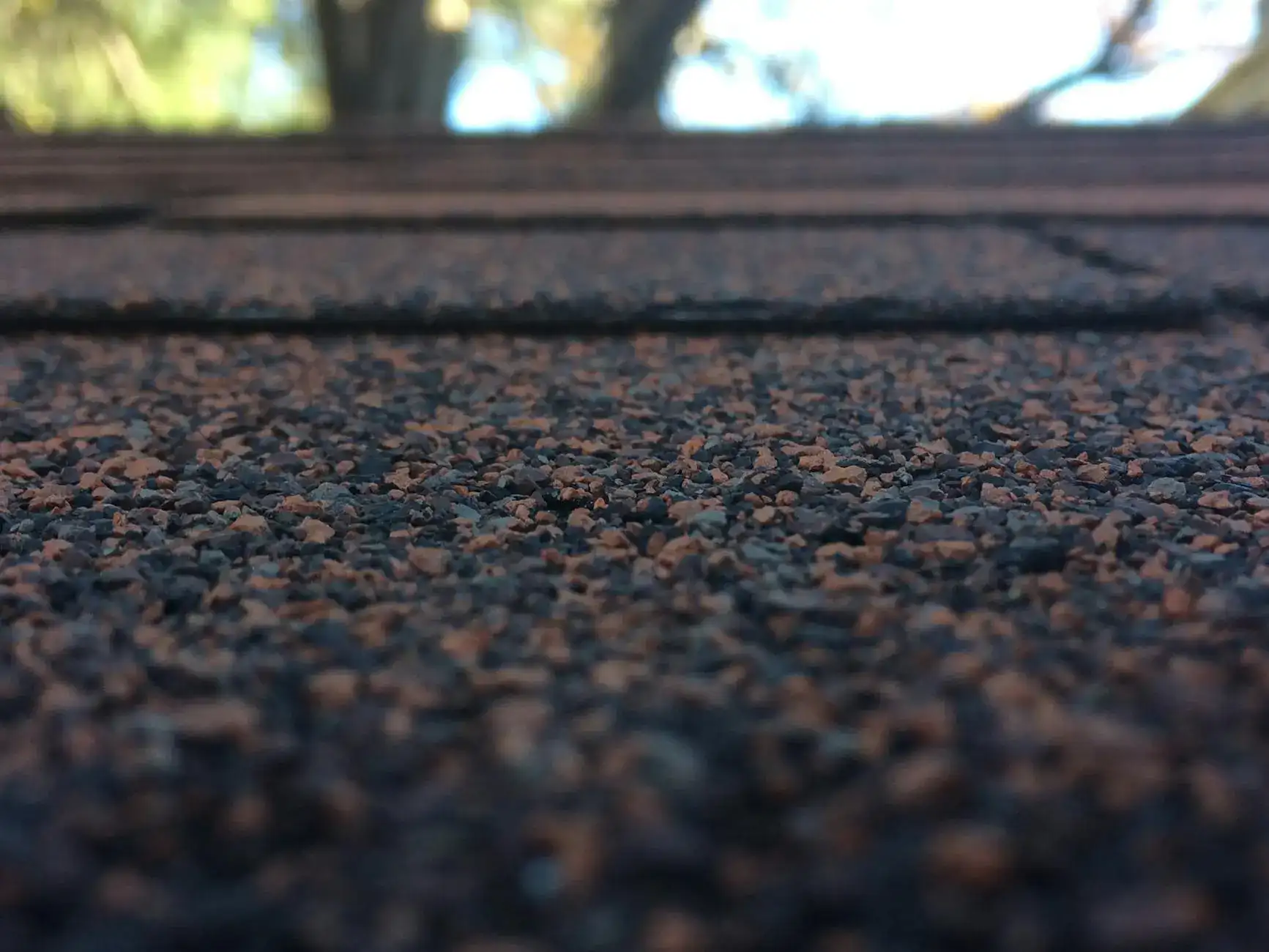 Close-up of quality asphalt roof shingles on a Knoxville home